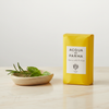 Acqua di Parma Alle Colonia Bar Soap 100g lifestyle on cream marble with botanicals