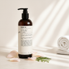 Le Labo Rose 31 Shower Gel 480ml lifestyle on cream marble with rose petals