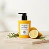 Acqua di Parma Alle Colonia Shampoo 300ml lifestyle on cream marble with lemon and rosemary