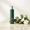 Crabtree & Evelyn Moisturize + Renew Conditioner 443ml lifestyle on cream marble with botanicals