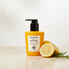 Acqua di Parma Alle Colonia Conditioner 300ml lifestyle on cream marble with lemon and rosemary