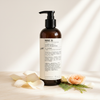 Le Labo Rose 31 Conditioner 480ml lifestyle on cream marble with rose petals