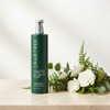 Crabtree & Evelyn Cleanse + Awaken Shower Gel 443ml lifestyle on cream marble with botanicals
